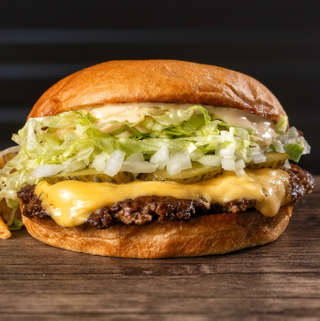 Producto Bigmac + papas fritas + salsa