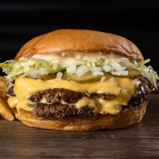 Producto Doble Bigmac + papas +salsa