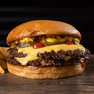 Producto Doble Cuarto de Libra + papas + salsa