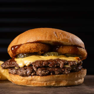 Producto Doble Rodeo king + papas + salsa