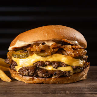 Producto Doble Super Bacon + papas + salsa