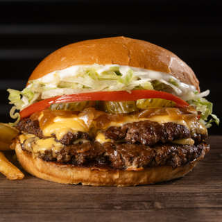 Producto Doble Clásica + papas + salsa