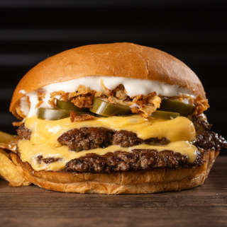 Producto Doble Crispy Hot + papas + salsa