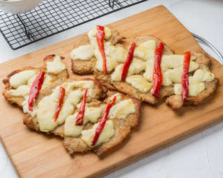 Producto Milanesa de pollo queso y pimiento asado