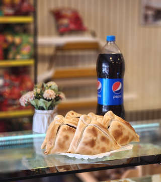 Producto 6 Empanadas más bebida 2L