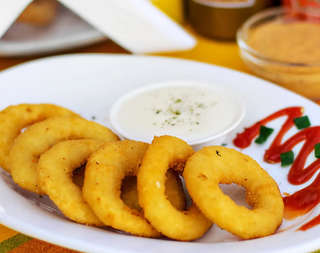 Producto Aros de cebolla con salsa moros 6 unidades